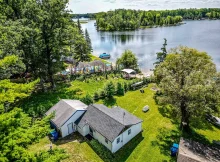 Discover a charming 2-bedroom cottage on Townline Lake, part of the chain of lakes perfect for all sports. $150,000