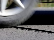 Here’s what those mysterious black cables on the road mean