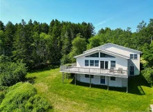 Experience unparalleled privacy and breathtaking ocean views with this 5.41-acre property featuring a sprawling private beach area perfect for beachcombing, $299,900