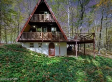 Mountainside Retreat: Your Adirondack Getaway  $219,900