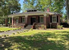 This distinctive brick bungalow