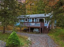 Nestled in the heart of Pocono Lake, this charming three-bedroom, two-bathroom house is a hidden gem waiting for your personal touch. $155,000