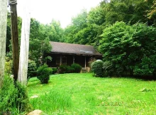 Rustic Retreat: Your Woodland Getaway $119,900