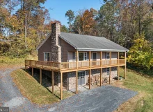 Discover your tranquil escape in this stunning custom-built home, nestled on 2.63 acres of serene land. $325,000