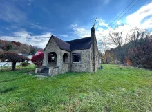 Investment Opportunity: Charming Stone Home Awaits Renovation $99,999